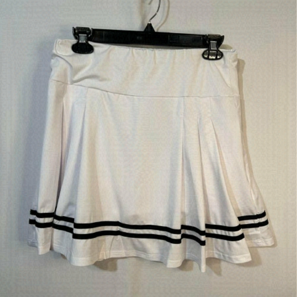 Woman’s varsity tennis skort. Black and white. Size XL. Shorts attached. Stretch